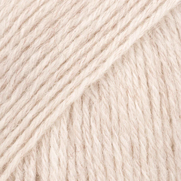DROPS Fabel Uni Colour 124 Arena blanca