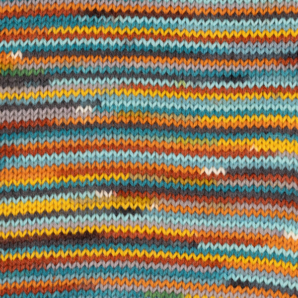 DROPS Fabel Print 928 Resplandor del atardecer