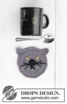 Extra 0-1388 Lucifurr by DROPS Design — Posavasos de unos 11 cm de diámetro. Un posavasos pesa unos 20 g; la mostaza se usa solo para los ojos. — 1